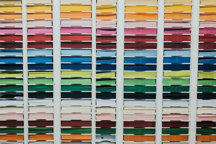 rows of colorful files stacked on top of each other