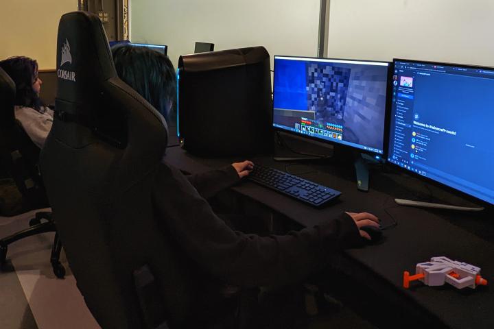 Two female students play Minecraft together in the University Center Esports & Gaming Facility