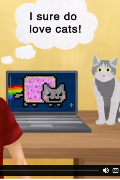 Illustration of a laptop and a cat on a desk with the words: I sure do love cats.