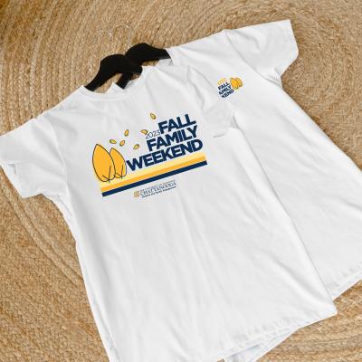 Fall Family Weekend 2023. t-shirt featuring blue and gold colors and 2 yellow trees
